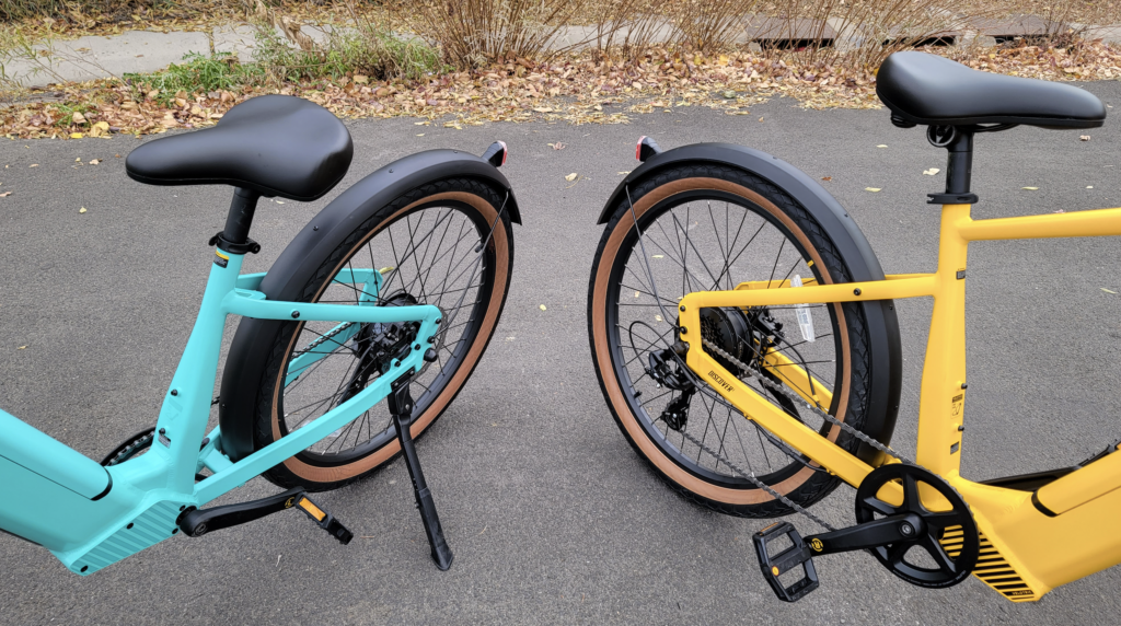 Velotric Discover 1 cyan and mango step over vs step through frame